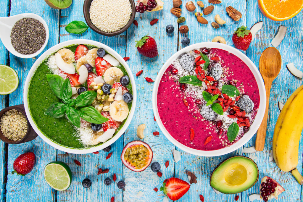 Two superfood bowls with ingredients that are some of the best superfoods for weight loss. 